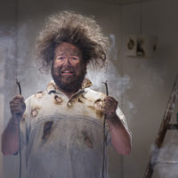 man with crazy hair from electrical explosion